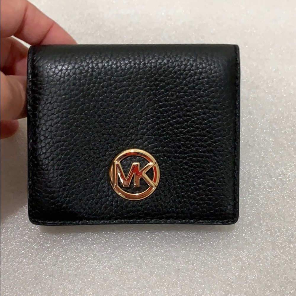 Michael Kors! Like new! Black leather wallet.